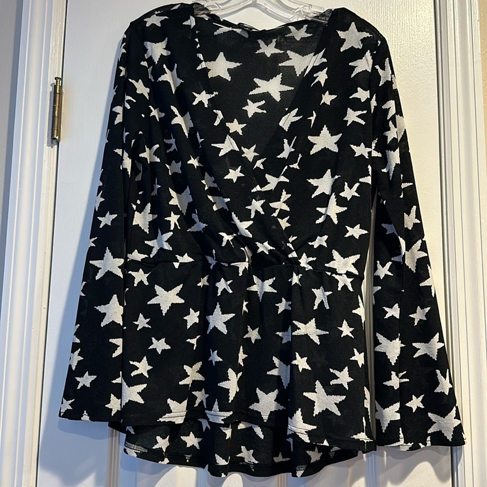 Star print deep v neck with elastic waist.